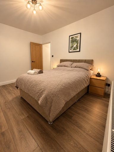 Double bedroom with wooden furniture, Bedfordshire holiday let
